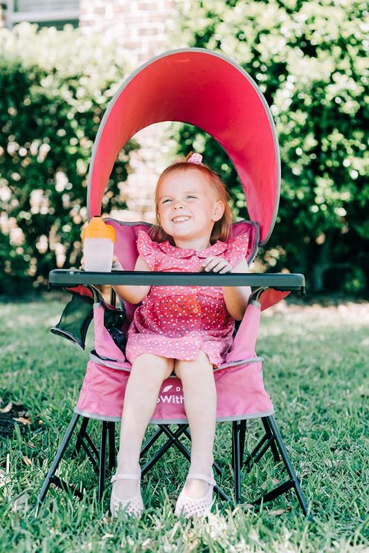Photo 1 of Baby Delight Go with Me Jubilee Deluxe Portable Chair | Indoor and Outdoor | Sun Canopy | Pink, Box Packaging Damaged, Moderate Use, Scratches and Scuffs Found on Item, Dirty From Previous Use, Hair Found on Item.

