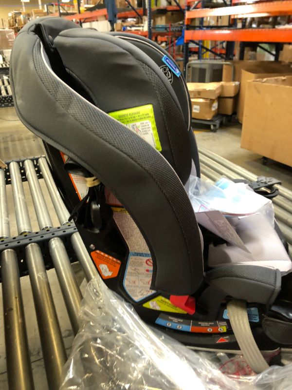 Photo 5 of Graco Slimfit 3 in 1 Car Seat | Slim & Comfy Design Saves Space in Your Back Seat, Redmond, Box Packaging Damaged, Moderate Use, Scratches and Scuffs Found on item, Missing Cup Holders.
