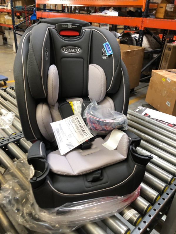 Photo 2 of Graco Slimfit 3 in 1 Car Seat | Slim & Comfy Design Saves Space in Your Back Seat, Redmond, Box Packaging Damaged, Moderate Use, Scratches and Scuffs Found on item, Missing Cup Holders.
