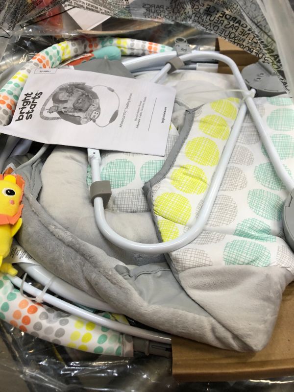 Photo 3 of Bright Starts Whimsical Wild Comfy Baby Bouncer Seat with Soothing Vibration and Music, Box Packaging Damaged, Moderate Use, Scratches and Scuffs Found on item, Hair Found on item. 
