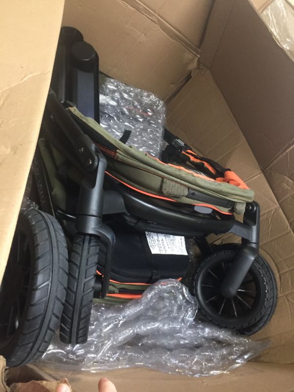 Photo 3 of Evenflo Pivot Xplore All-Terrain Stroller Wagon, Box Packaging Damaged, Moderate Use, Scratches and Scuffs on item, Missing Some Parts, and Hardware, Selling for Parts.