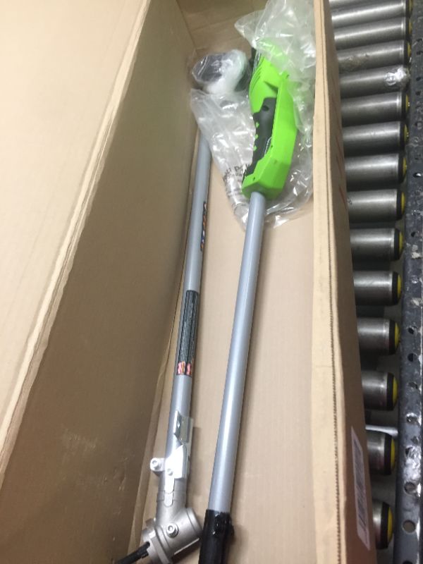 Photo 4 of Greenworks 18-Inch 10 Amp Corded String Trimmer (Attachment Capable) 21142, Box Packaging Damaged, Moderate Use, Scratches and Scuffs on item, Missing Parts, and Hardware, Selling for Parts.