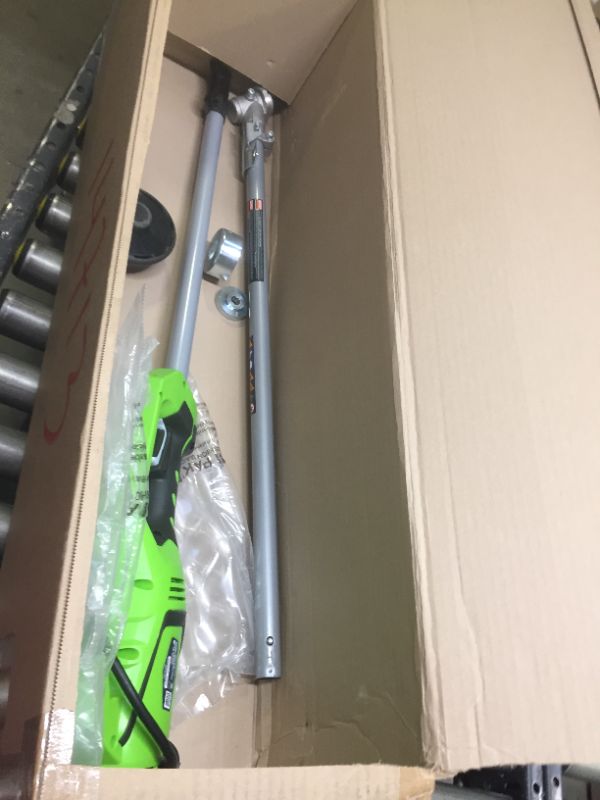 Photo 3 of Greenworks 18-Inch 10 Amp Corded String Trimmer (Attachment Capable) 21142, Box Packaging Damaged, Moderate Use, Scratches and Scuffs on item, Missing Parts, and Hardware, Selling for Parts.