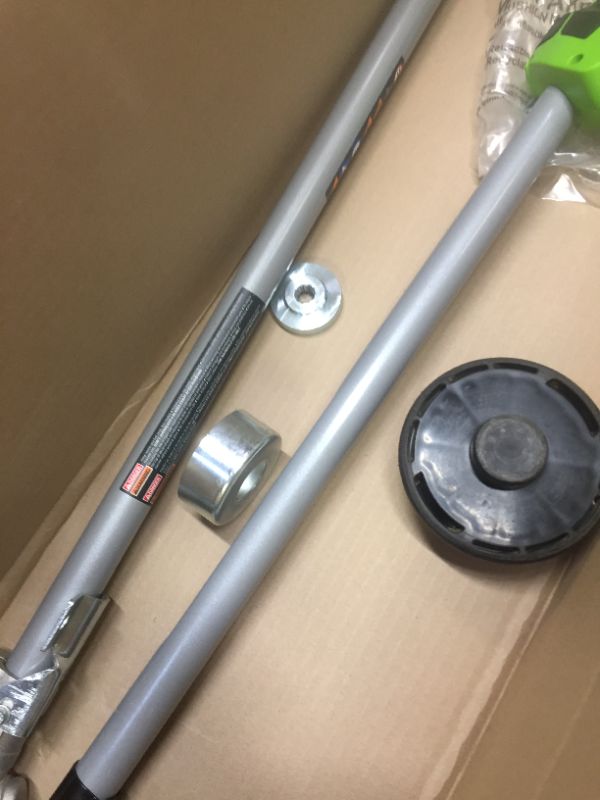 Photo 7 of Greenworks 18-Inch 10 Amp Corded String Trimmer (Attachment Capable) 21142, Box Packaging Damaged, Moderate Use, Scratches and Scuffs on item, Missing Parts, and Hardware, Selling for Parts.
