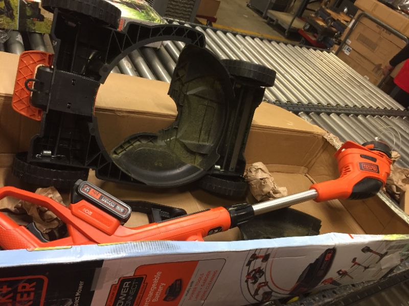Photo 1 of Black & Decker MTC220 Max Cordless Lithium-Ion 3-in-1 Trimmer/Edger & Mower, Orange/ Black, Box Packaging Damage, Moderate Use, Scratches and Scuffs Found on Item, Hardware Loose in Box, Missing Hardware, Tested, works, Dirty From Previous Use