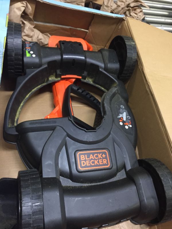 Photo 3 of Black & Decker MTC220 Max Cordless Lithium-Ion 3-in-1 Trimmer/Edger & Mower, Orange/ Black, Box Packaging Damage, Moderate Use, Scratches and Scuffs Found on Item, Hardware Loose in Box, Missing Hardware, Tested, works, Dirty From Previous Use