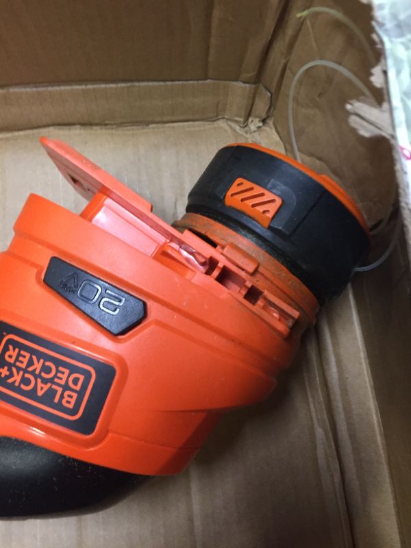 Photo 8 of Black & Decker MTC220 Max Cordless Lithium-Ion 3-in-1 Trimmer/Edger & Mower, Orange/ Black, Box Packaging Damage, Moderate Use, Scratches and Scuffs Found on Item, Hardware Loose in Box, Missing Hardware, Tested, works, Dirty From Previous Use