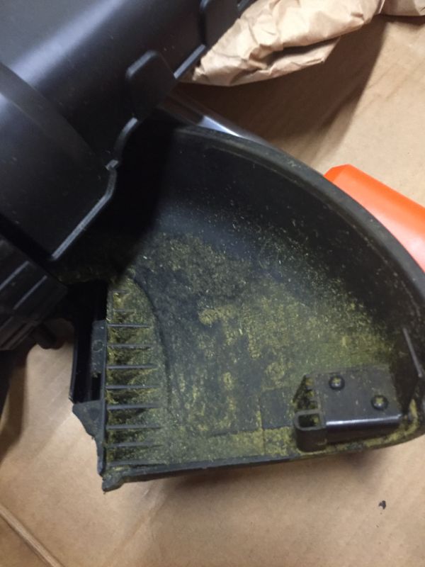 Photo 7 of Black & Decker MTC220 Max Cordless Lithium-Ion 3-in-1 Trimmer/Edger & Mower, Orange/ Black, Box Packaging Damage, Moderate Use, Scratches and Scuffs Found on Item, Hardware Loose in Box, Missing Hardware, Tested, works, Dirty From Previous Use