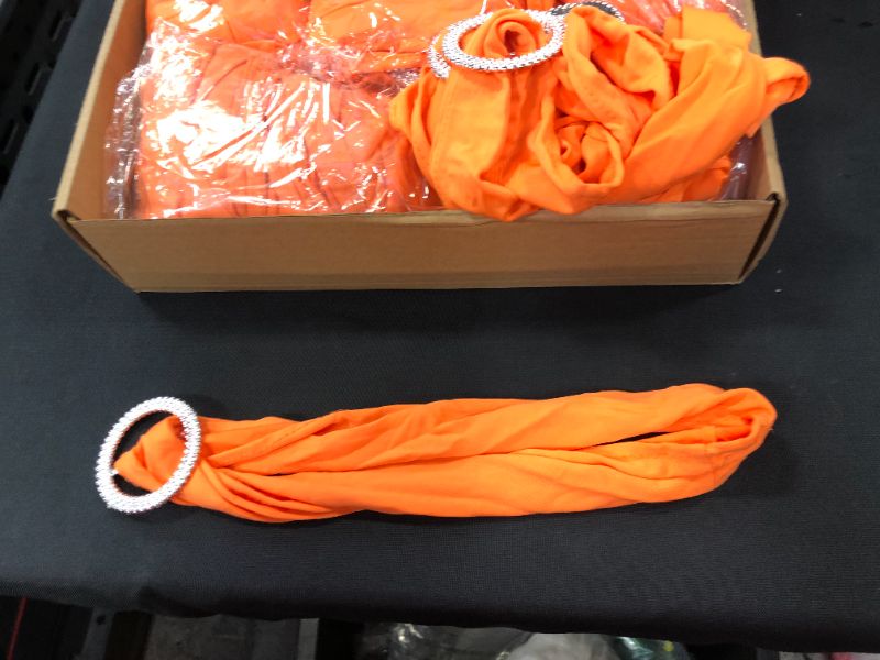 Photo 1 of 50 count  bright orange stretch chair sashes 