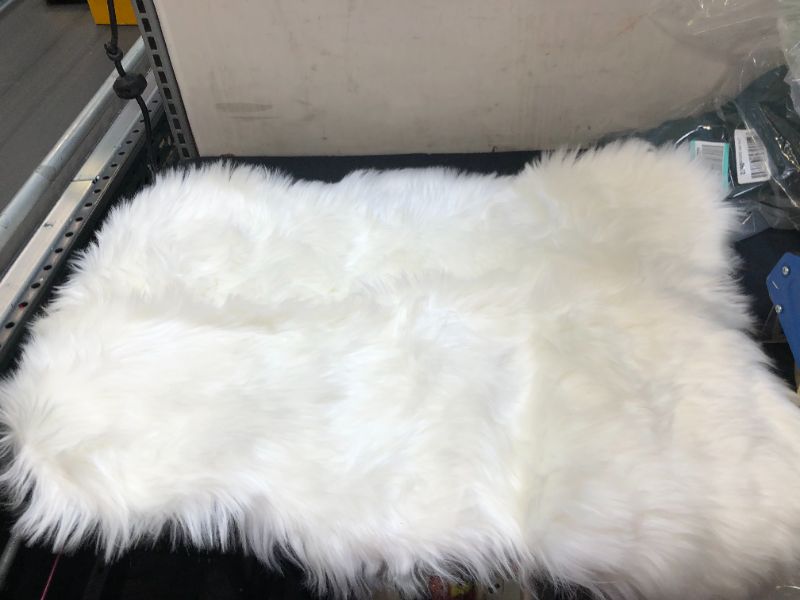 Photo 2 of Ashler Faux Fur Rug, Fluffy Shaggy Area Rug Ultra Soft 2 x 3 Feet Sheepskin Fur Rug, White Fuzzy Rug Machine Washable Shag Rug, Nursery Decor Throw Rugs for Bedroom, Kids Room, Living Room
