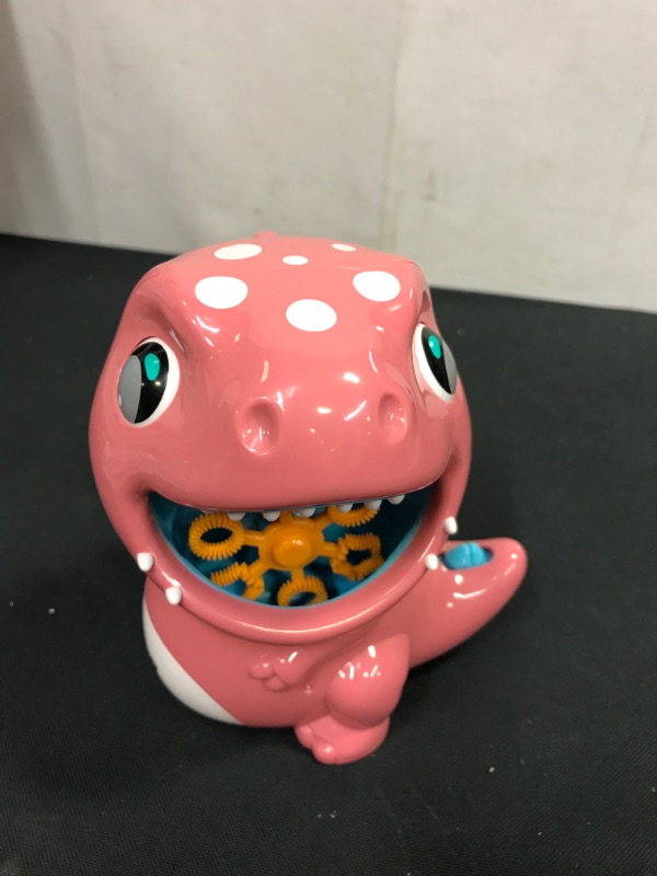Photo 2 of DINOSAUR BUBBLE MACHINE FOR KIDS AND LIGHT EYES AGE 3+ (PINK)
