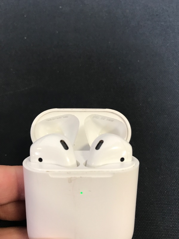 Photo 4 of Apple AirPods with Charging Case (Latest Model) ---- (HAS FEW SCRATCHES AND ARE DIRTY) 