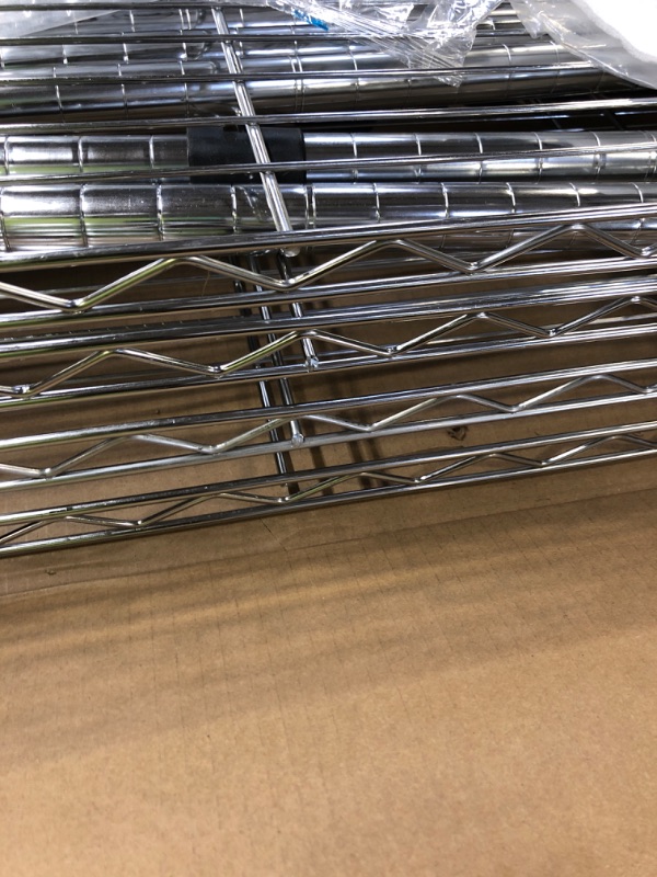 Photo 3 of Amazon Basics 4-Shelf Adjustable, Heavy Duty Storage Shelving Unit (350 lbs loading capacity per shelf), Steel Organizer Wire Rack, Chrome (36L x 14W x 54H)
