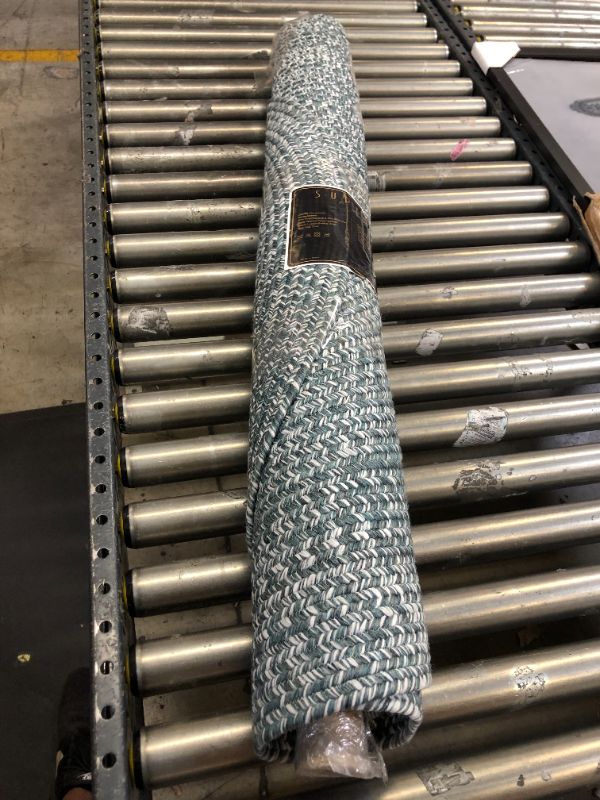 Photo 1 of 4'X6' OVAL AREA RUG