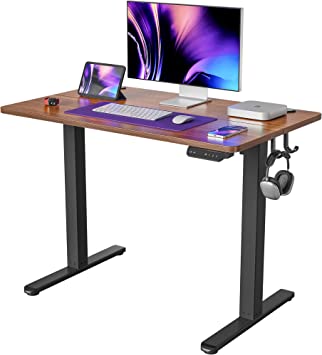 Photo 1 of FEZIBO Electric Standing Desk, 40 x 24 Inches Height Adjustable Table, Ergonomic Home Office Furniture with Splice Board, Black Frame/Espresso Top
