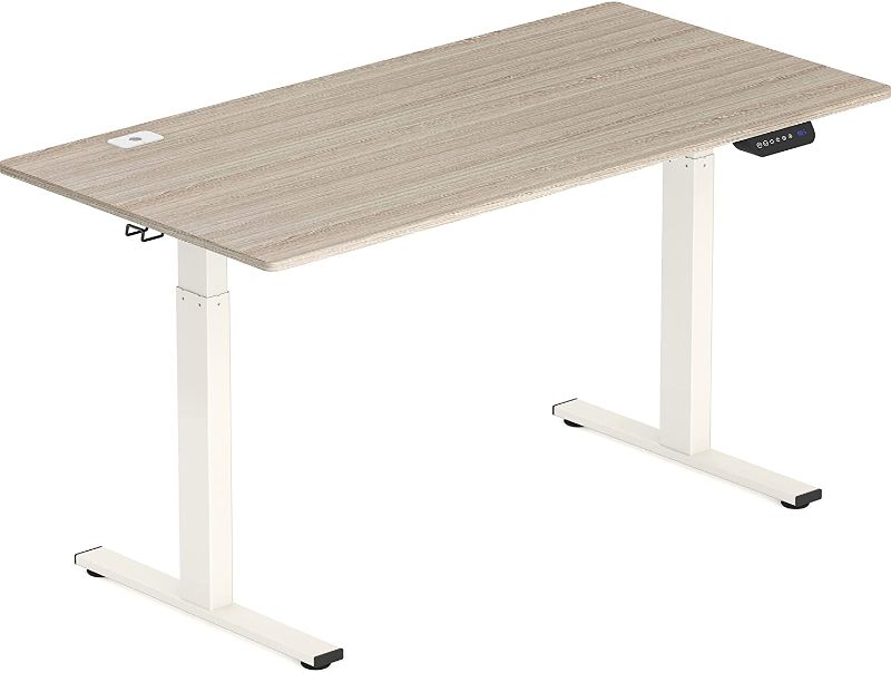 Photo 1 of SHW 55-Inch Large Electric Height Adjustable Standing Desk, 55 x 28 Inches, Maple