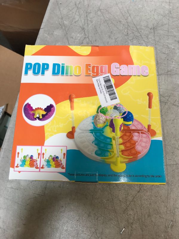 Photo 2 of Dinosaur Toys for Kids, Interactive Dinosaur Pop Fidget Toy Pop Dice Dinosaur Eggs Game Creative Dinosaur Birthday Party Supplies Push Pop Sensory Toys for Kids (Style B)
