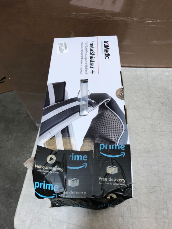 Photo 1 of TruMedic InstaShiatsu+ Neck, Back, Shoulder Massager - 3 Massage Speeds, Cordless & Rechargeable, Shiatsu Neck Massager with Heat - Use at Home & Office for Full Body Shiatsu Relaxation (IS-3000PRO)
damaged packaging 