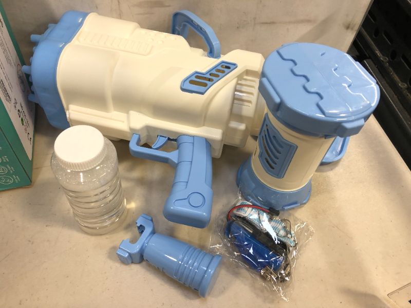 Photo 2 of Kids Toy Rotary rocket launcher foaming machine toy