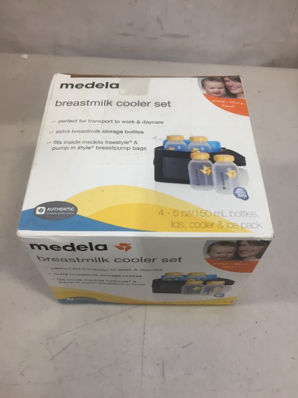 Photo 4 of Medela Breast Milk Cooler and Transport Set, 5 ounce Bottles with Lids, Contoured Ice Pack, Cooler Carrier Bag
