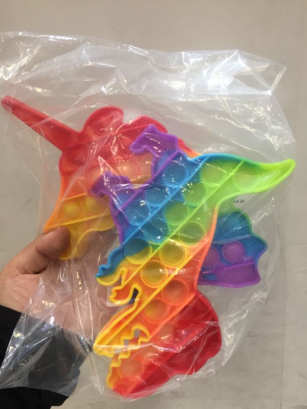 Photo 1 of MULTICOLOR UNICORN AND DINOSAUR POP IT FIDGETS 