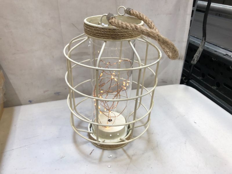 Photo 1 of 9.5" White Battery Operated Metal Cage Lantern with LED Fairy Lights, Decorative Table Lamp with Timer Function for Indoor Use
