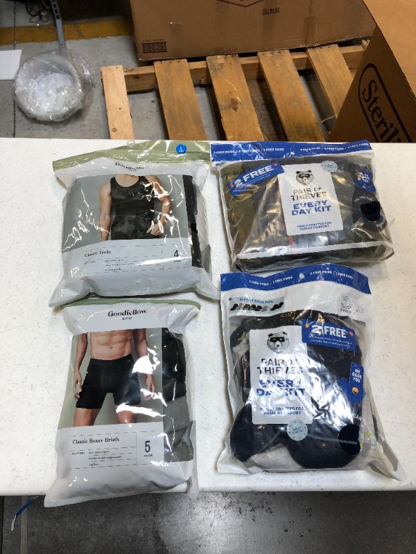 Photo 1 of Bag Lot 4 PACKS MENS Clothing Items SIZES LARGE SHIRTS, SMALL & LARGE BOXER BRIEFS, 6-12 SOCKS