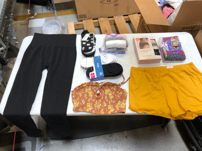 Photo 1 of Bag Lot 8 WOMEN'S Clothing Items SIZES, LARGE LEGGINGS & SHORTS, MEDIUM TOP, 8 & 6 UNDERWEAR, 4-10 SOCKS