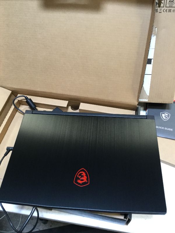 Photo 2 of MSI GF63 15.6" Gaming Laptop - Black (Intel Core I5-10500H/256GB SSD/8GB RAM/NVIDIA GeForce GTX1650)