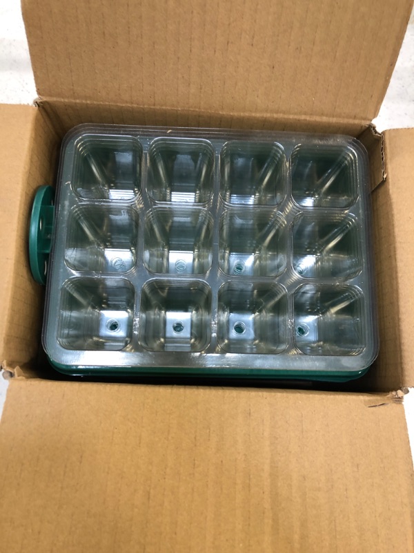 Photo 1 of box of potting trays 