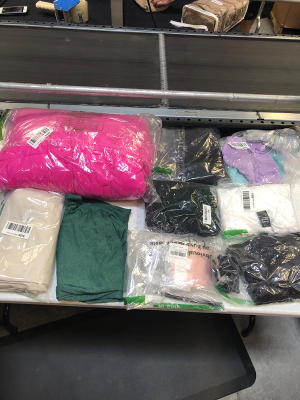 Photo 1 of bundle of misc clothes size variare 