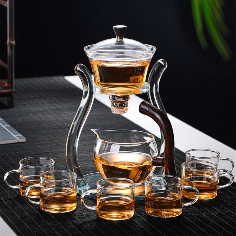 Photo 1 of Aoheuo Lazy Kungfu Glass Tea Set Magnetic Water Diversion Rotating Cover Bowl Semi-Automatic Glass Teapot Suit (Crystal Glass)
