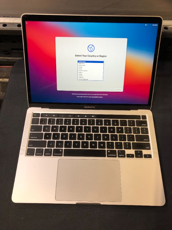 Photo 2 of 2020 Apple MacBook Pro with 2.3 GHz Intel Core i7 (13 inch, 32GB RAM, 512GB SSD) Space Gray - silver (Renewed)
used - item turns on - minor use 