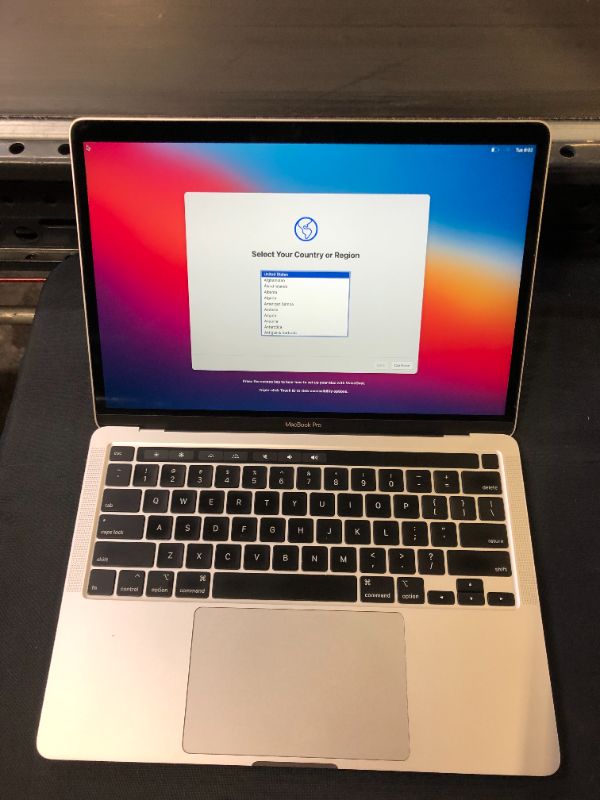 Photo 3 of 2020 Apple MacBook Pro with 2.3 GHz Intel Core i7 (13 inch, 32GB RAM, 512GB SSD) Space Gray - silver (Renewed)
used - item turns on - minor use 