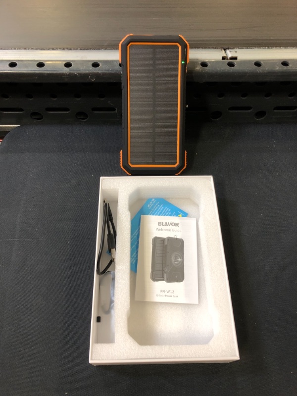 Photo 2 of BLAVOR Solar Charger Power Bank 18W, QC 3.0 Portable Wireless Charger 10W/7.5W/5W with 4 Outputs & Dual Inputs, 20000mAh External Battery Pack IPX5 Waterproof with Flashlight & Compass (Orange)
