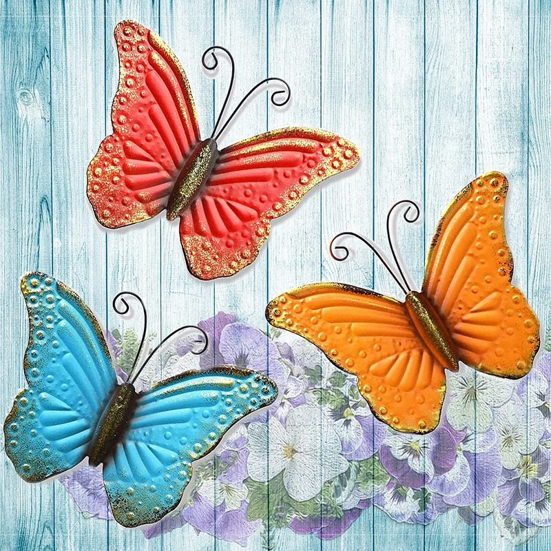 Photo 1 of aboxoo 3D Metal Butterfly Wall Decor, Wall Art, Hanging Sculpture for Bathroom, Living Room, Bedroom or Porch (3 Pieces)
