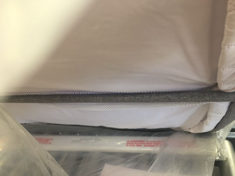 Photo 1 of Simmons Kids By The Bed City Sleeper Bassinet for Twins - Adjustable Height Portable Crib with Wheels & Airflow Mesh, Grey Tweed