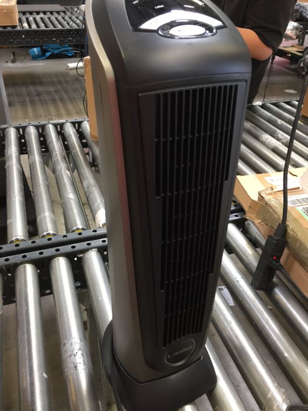 Photo 2 of Lasko Lasko-22 Digital Ceramic Oscillating Remote (751320) Tower Heater, 8.5x2033 L x 7.25x2033 W x 23x2033 H, Grey/Black
