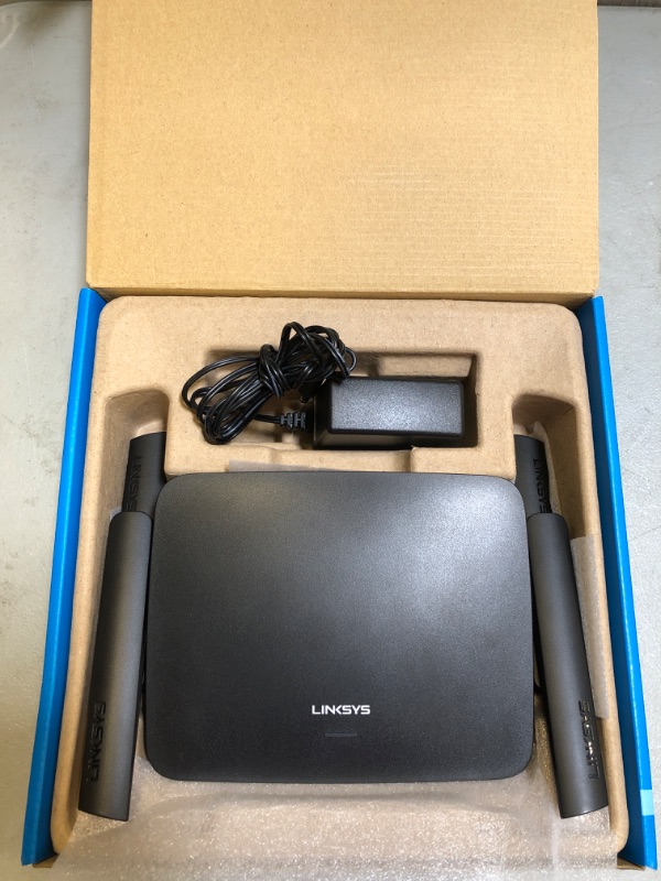 Photo 5 of Linksys RE9000: AC3000 Tri-Band Wi-Fi Extender, Wireless Range Booster for Home, 4 Gigabit Ethernet Ports, Works with Any Wi-Fi Router (Black)
