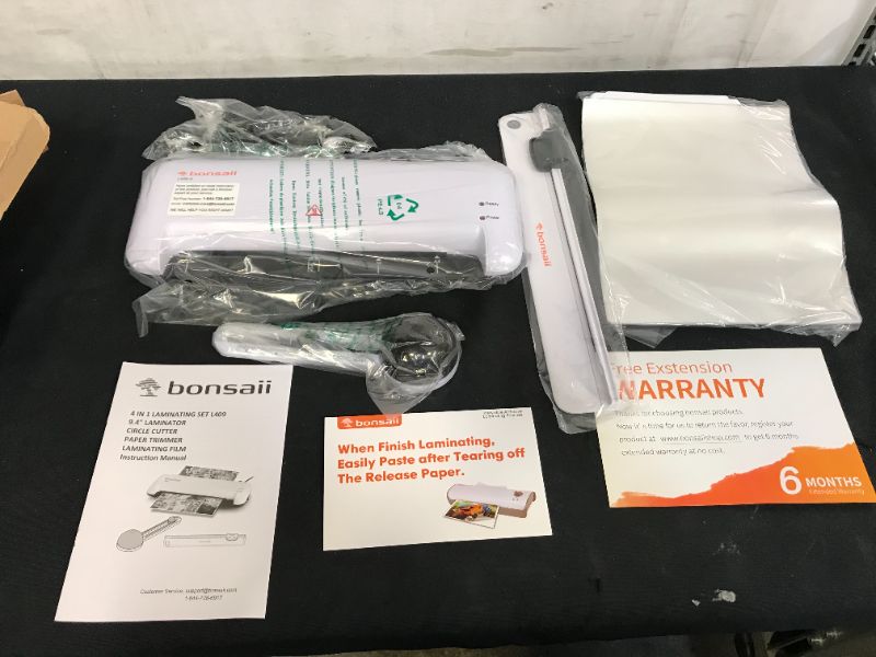 Photo 3 of Thermal Laminator, Bonsaii A4 Laminating Machine for Home/Office/School, Quickly Heat Up 9 Inch Hot and Cold Lamination Machine, Includes 25 Laminating Pouches,Paper Trimmer and Circle Cutter (L409-A)

USED LIKE NEW