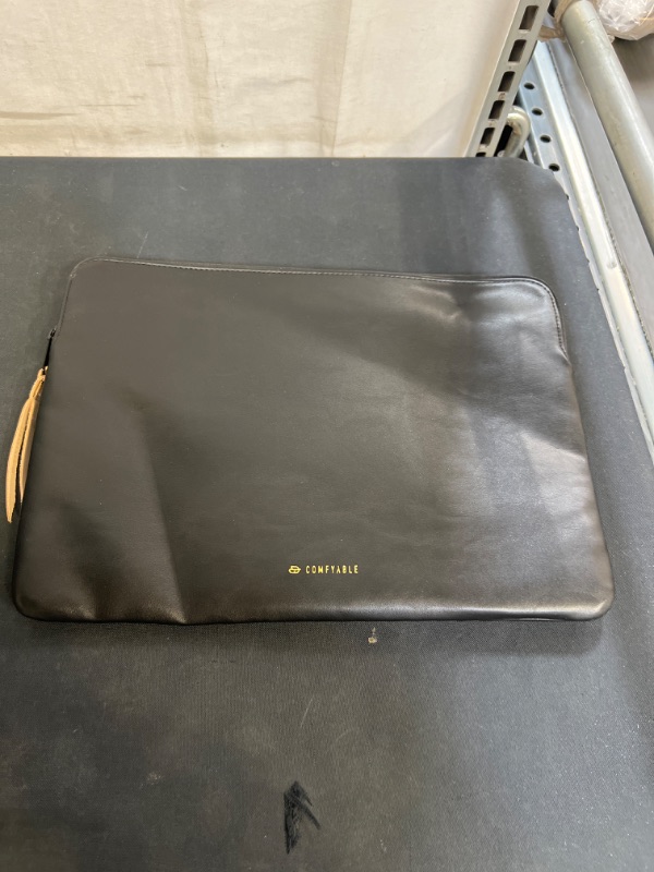 Photo 2 of Comfyable Slim Protective Laptop Sleeve 13-13.3 inch Compatible with 13 inch MacBook Pro and MacBook Air (ITEM HAS A CREASE AND STICKER ON IT)