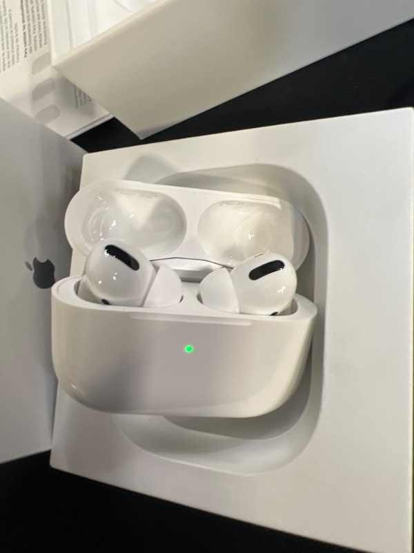 Photo 3 of Apple AirPods Pro Wireless Earbuds with MagSafe Charging Case. Active Noise Cancelling, Transparency Mode, Spatial Audio, Customizable Fit, Sweat and Water Resistant. Bluetooth Headphones for iPhone (ITEM HAS A STAIN ON ONE OF THE EARBUDS)
