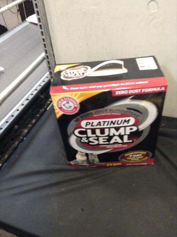 Photo 2 of ARM and HAMMER Clump and Seal Platinum Clumping Cat Litter EXP 2/22