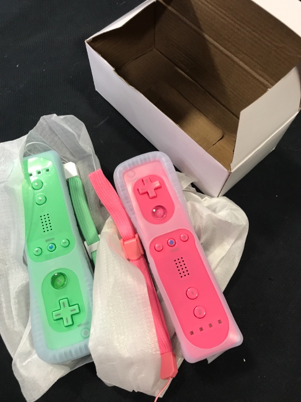 Photo 2 of Wii Controller, KDYGPDCT 2 Pack Wii Remote, with Silicone Case and Wrist Strap, Compatible with Wii Console (Ice Blue and Pink)