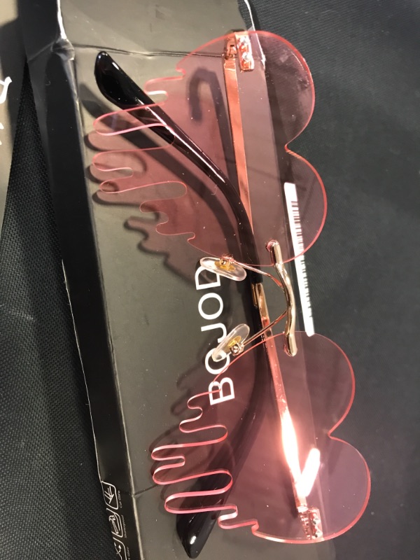 Photo 3 of BOJOD Dripping Heart Shaped Sunglasses for Women Heart Glasses Trendy Sunglasses for Party