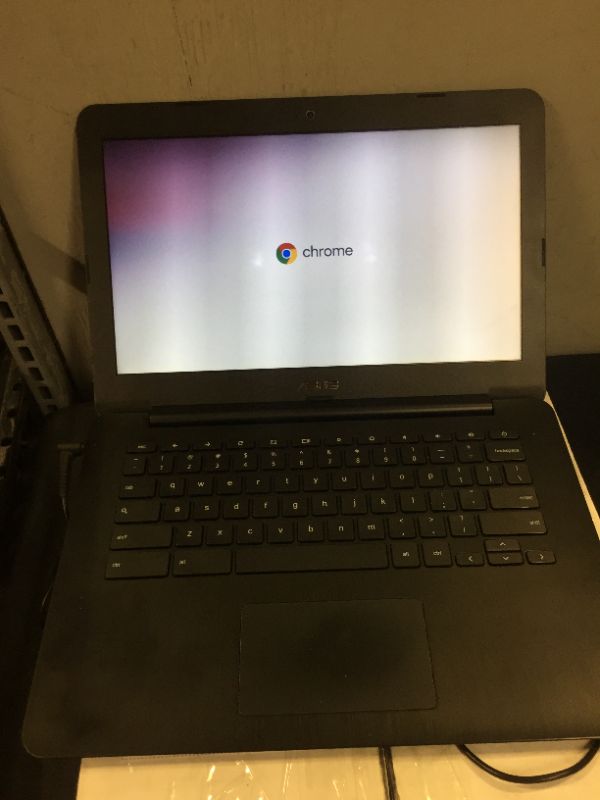 Photo 8 of ASUS Chromebook 13.3-Inch HD with Gigabit WiFi, 16GB Storage & 4GB RAM (Black)
(USED) (NEEDS TO BE STARTED)