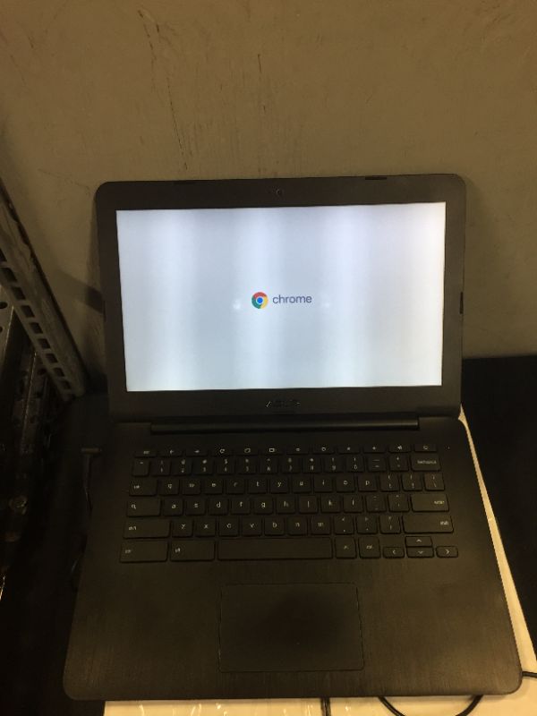 Photo 4 of ASUS Chromebook 13.3-Inch HD with Gigabit WiFi, 16GB Storage & 4GB RAM (Black)
(USED) (NEEDS TO BE STARTED)
