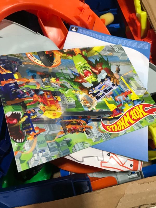 Photo 1 of Hot Wheels Track Set, Ultimate Garage Toy Vehicle Playset With Moving T-Rex Dinosaur, Storage For 100+ Vehicles, 3ft+ Tall
