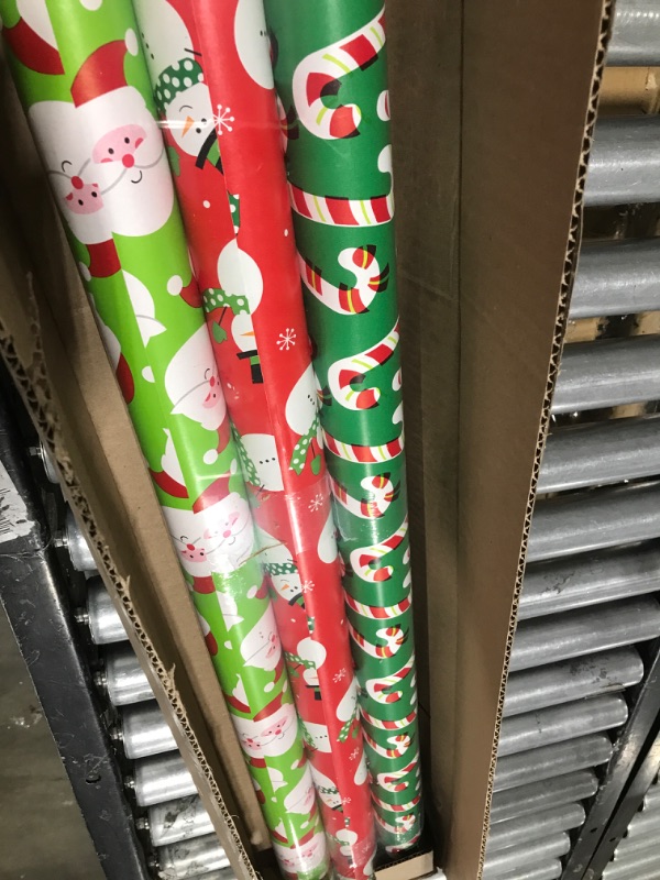 Photo 3 of American Greetings Reversible Christmas Extra-Wide Wrapping Paper Bundle, Santa, Snowmen and Candy Canes (3 Rolls, 120 sq. ft.)