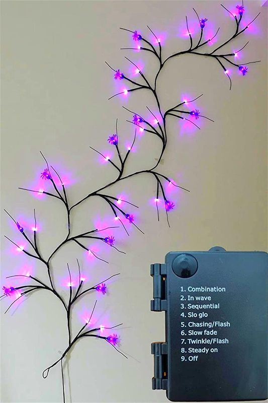 Photo 1 of 6FT Halloween Lighted Willow Branches Garland with Lights 8 Modes 48 LED Waterproof Battery Operated with Timer Vine Lights for Bedroom Party Indoor Outdoor Holiday Wall Fireplace(Spider Lights) 